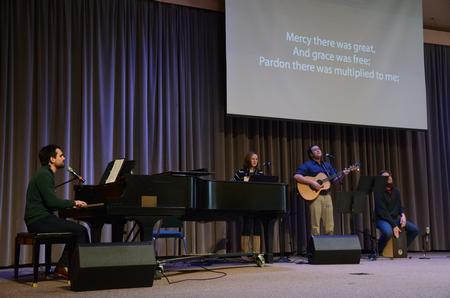 Cody Curtis, assistant residence director and wife, Melodie Curtis, along with Cameron Skonhovd, junior psychology major, and David Key, sophomore, played a few songs in chapel before Kevin Ezell spoke to students in the G.M. Savage Memorial Chapel - Photo by Elizabeth Wilson