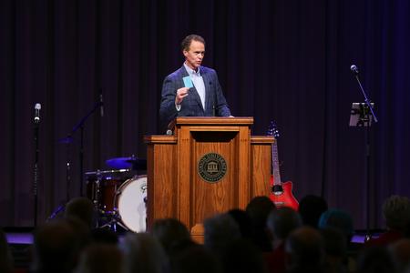 Earnest Easley, professor of evangelism, welcomes guests to the West Tennessee Evangelism Rally. - Photo by Kristi McMurry Woody