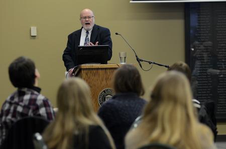 Daniel Dreisbach speaks during the Provost's Lecture to an audience in the Brewer Dining Hall. - Photo by MiKalla Cotton