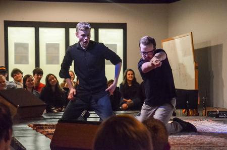 Clark Hubbard, freshman political science major, and Daniel Ashworth, freshman elementary education major, act as hobbits at the pop-up Blank Slate Improv show. - Photo by Gretchen Foels