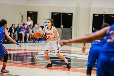 Jada Smith looks for an open teammate during the first round game of the Gulf South Conference Tournament against the University of West Georgia. - Photo by Kristi McMurry Woody
