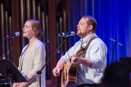 Kelsie Edgren, alumna, and Ken Litscher, director of residence life, lead worship in the G.M. Savage Memorial Chapel. - Photo by David Parks
