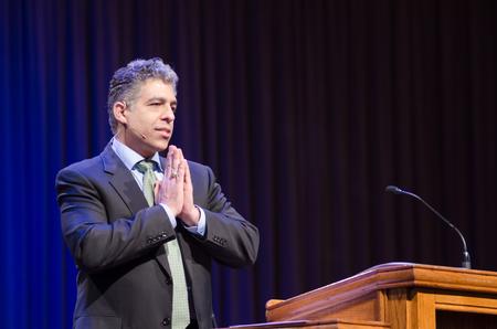Omar Hamada, physician strategist, explains how prayer is a Christian's most powerful weapon, encouraging the congregation to "pause and pray" unceasingly. - Photo by David Parks