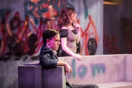 James Matthew Wyatt, freshman political science major, performs as Raim in The Queen and the Rebels in the W.D. Powell Theatre. - Photo by Kristi McMurry Woody
