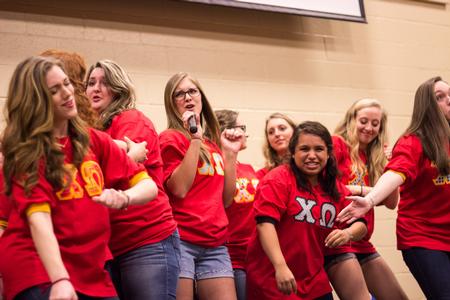 Chi Omega sisters take the stage during a song in the Pancakes & Karaoke Party benefiting Make-A-Wish® Mid-South. - Photo by David Parks
