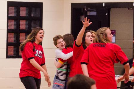 Maria Tatman, EDGE student, laughs with her Chi Omega friends after a successful night of Pancakes & Karaoke in the Bowld Student Commons. - Photo by David Parks