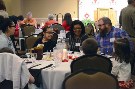 Students and families chat before the EDGE Banquet begins in the Grant Events Center. - Photo by MiKalla Cotton