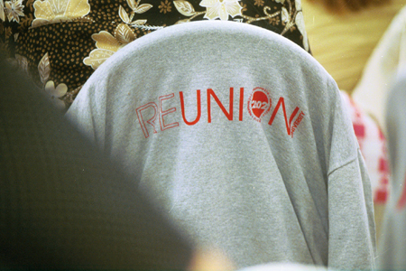 The theme of this year's Faculty/Staff Dinner was <i>ReUnion 2002,</i> which was printed on a t-shirt for each attendee. - Photo by Jim Veneman