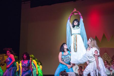 Sorority sisters lift up their queen in Zeta Tau Alpha's Variety Show act. - Photo by David Parks