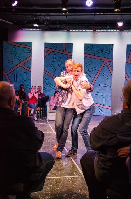 Jonathan Bowman, sophomore biology major, and Dub Oliver, president of the university, perform at the Blank Slate Improv "Dub" Show. - Photo by Gretchen Foels