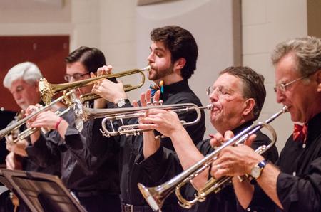 Trumpet players blast cheerful notes during the jazz band concert in Hartley Hall.  - Photo by David Parks