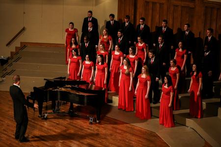 University Singers led by Chris Mathews, professor of music and department chair, perform during the spring choral concert.  - Photo by Kristi McMurry Woody