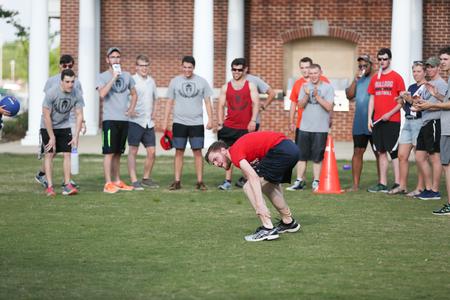 Students cheer on their teammate competing in a Res Life Field Day relay. - Photo by Kristi McMurry Woody