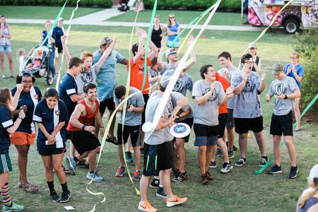 The residents of Dodd cheer under falling streamers as they are announced as the winners of the Union Cup during Res Life Field Day.  - Photo by Kristi McMurry Woody