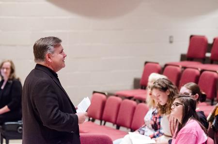 Stanley Warren, professor of music, introduces the characters and the scene for the Opera Workshop. - Photo by Gretchen Foels