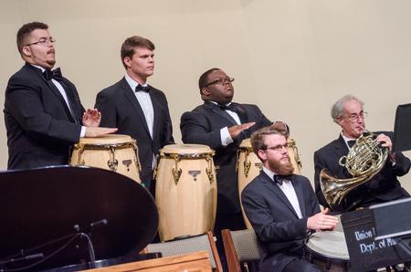 Percussionists play during the Symphonic Band concert in First Baptist Church. - Photo by David Parks