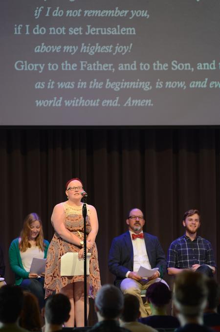 Katie Chappell, freshman English major, leads a reading during the honors community lead chapel service. - Photo by MiKalla Cotton