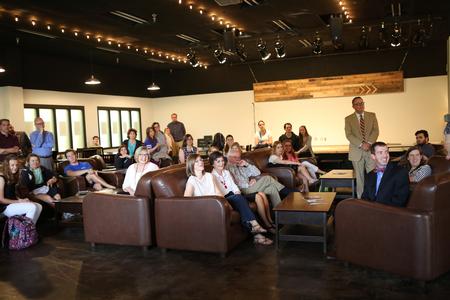 Members of the Barefoot family and the Union community listen attentively to Hyran Barefoot's stories during the 20th anniversary celebration of the naming of the Barefoot Student Union Building. - Photo by Kristi McMurry Woody
