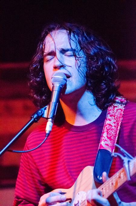 A member of Maps & Atlases sings during a performance in Barefoots Joe. - Photo by Gretchen Foels