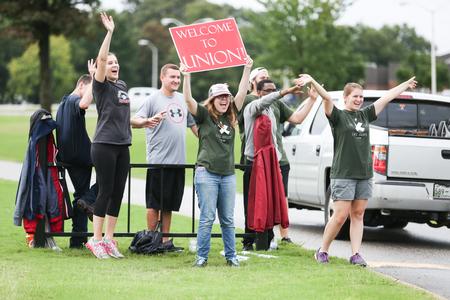 Life Group leaders cheer to welcome new students and their families onto campus for Welcome Week. - Photo by Kristi McMurry Woody