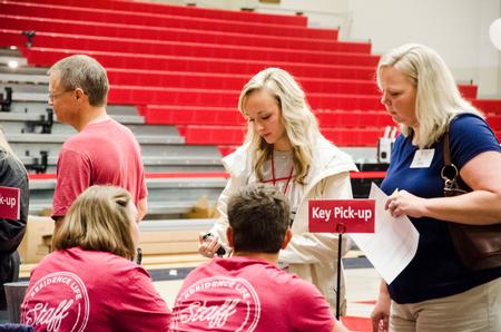 New students check in to pick up their keys before moving in. - Photo by Gretchen Foels