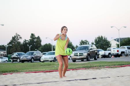 Bekah Guthrie, junior, Chemistry major gets ready to serve the volleyball in an intramural sand volleyball game.  - Photo by Morgan Morfe