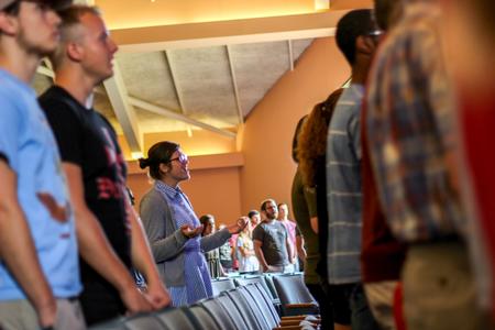 Brooklyn Croom, sophomore vocal performance major worships in the G.M. Savage Memorial Chapel.  - Photo by Morgan Morfe