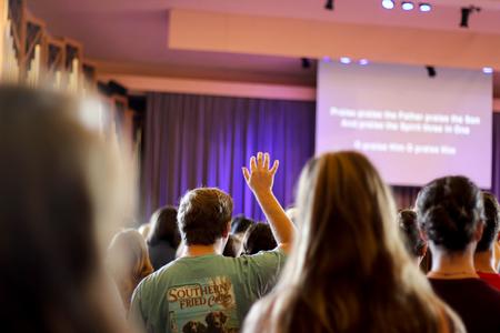 Bryan Walker, senior TESL and Spanish major worships in the G.M. Savage Memorial Chapel. - Photo by Morgan Morfe