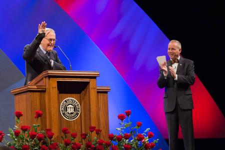 Donald Rumsfeld waves to the audience at the conclusion of his speech at the 19th annual Scholarship Banquet. - Photo by Janelle Vest