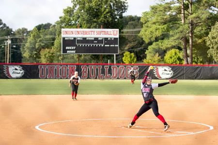 Gabby Morris, freshman nursing major, pitches the ball during a Saturday game against Northeast Mississippi Community College during Family Weekend.  - Photo by Morgan Morfe