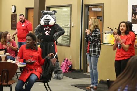 The cheer team reveals the new Buster mascot during lunch in the Brewer Dining Hall. - Photo by Kristi McMurry Woody