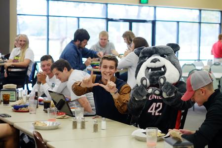 Buster the Bulldog hangs out with students in the Brewer Dining Hall after revealing his new look. - Photo by Kristi McMurry Woody