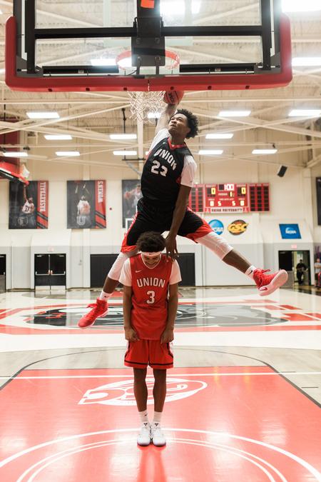Charlie Wilson dunks over Tray Boyd III during Bulldog Madness. - Photo by Kristi McMurry Woody