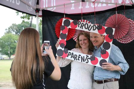Families enjoyed the many booths set up by campus organizations on the Great Lawn during Union Night. - Photo by Elizabeth Wilson