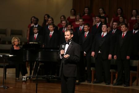 Dan Musselman, associate professor of music and acting chair, thanks guests for coming to the annual Fall Choral Concert. - Photo by Kristi McMurry Woody
