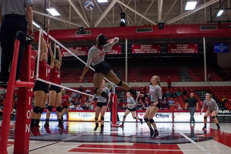 Deja Moorer, senior, goes for a kill during Union University's win against West Alabama.  - Photo by Morgan Morfe