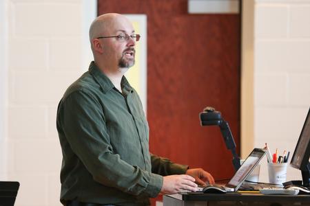 Joshua Veltman, professor of music, teaches a class in Hartley Hall. - Photo by Kristi McMurry Woody