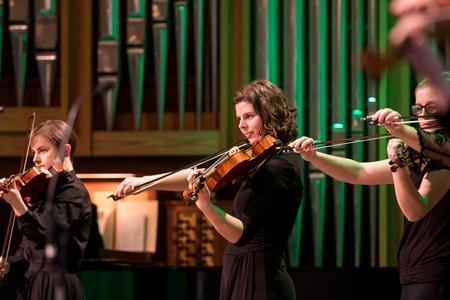 Virginia Bantz, senior biology major, plays the violin during "Carol of Bells" at Union's annual Christmas concert.  - Photo by Morgan Morfe