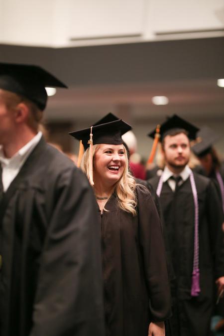 Graduates process into West Jackson Baptist Church for fall commencement. - Photo by Kristi McMurry Woody
