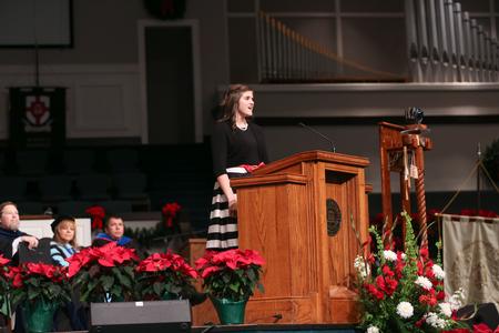 Brooklyn Croom, music performance major, sings "The Bird's Song" during fall commencement.  - Photo by Kristi McMurry Woody