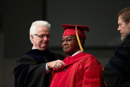 Isais Uaene, doctor of ministry, receives his doctoral hood during fall commencement.  - Photo by Kristi McMurry Woody