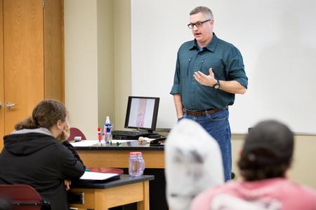 Marc Lockett, associate professor of biology, lectures during a histology lab.  - Photo by Kristi McMurry Woody