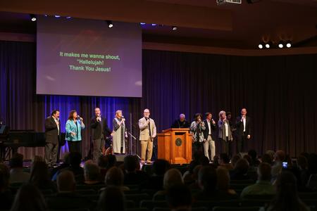 Guests of the West TN Evangelism Rally worship at the start of the event. - Photo by Kristi McMurry Woody