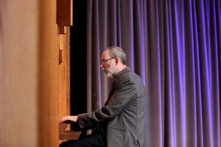 Terry McRoberts, university professor of music, plays the organ for chapel. - Photo by Kristi McMurry Woody