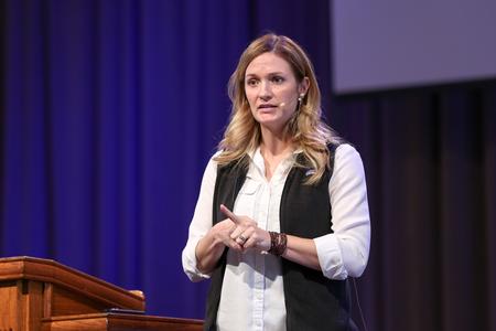 Megan Almon speaks in chapel. - Photo by Kristi McMurry Woody