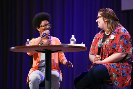 Melanie Taylor, director of discipleship ministries, and Ally Currie, university ministries assistant, speak in chapel about racial reconciliation. - Photo by Kristi McMurry Woody