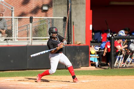 Paige Robertson swings at a pitch from her Lane College opponent. - Photo by Kristi McMurry Woody
