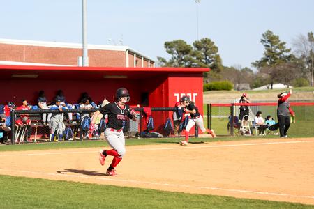 Gabby Morris runs to first base after getting a hit against Lane College.  - Photo by Kristi McMurry Woody
