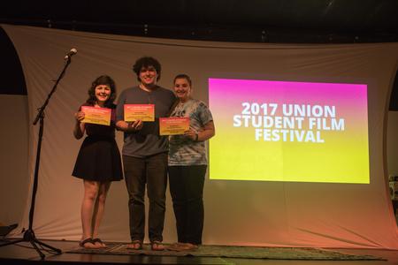 Priscilla Porter, senior theatre major, Matthew Wallace, junior theatre major, and Ashley Seiber, freshman Christian ministry & missions major, receive an award for "Best Supporting Performance" at the 2017 Union Student Film Festival.  - Photo by Morgan Morfe