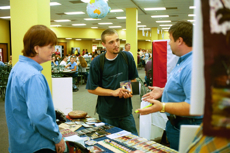 Displays are set up in the cafeteria to assist students in questions and interests in global and regional missions during GO Week 2002. - Photo by Amanda Smith